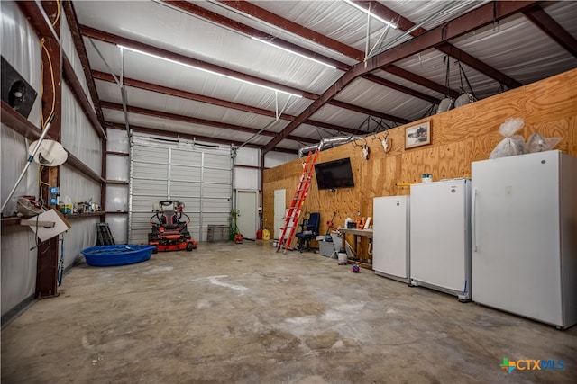 garage with white refrigerator