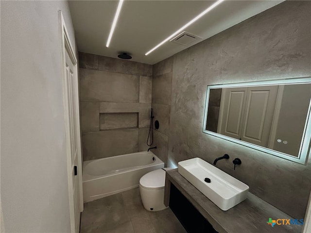 3104 Zephyr Rd, Killeen, TX 76543 - full bathroom featuring toilet, a combined bath / shower with rainfall shower, and vanity