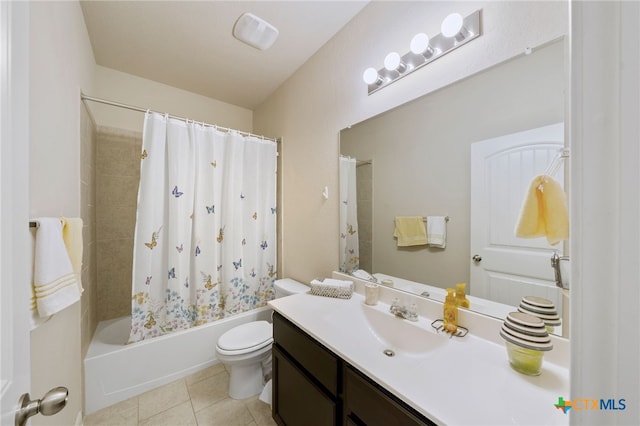 full bathroom featuring vanity, tile patterned flooring, shower / bathtub combination with curtain, and toilet