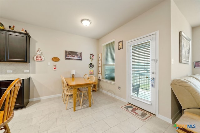 view of tiled dining area