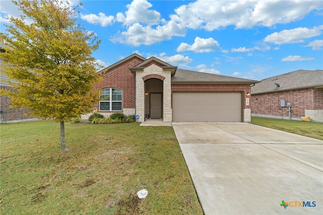 view of front of house featuring a front lawn and a garage