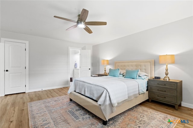 151 Crest Circle Dr, San Marcos, TX 78666 - bedroom featuring light wood-style floors, baseboards, and a ceiling fan