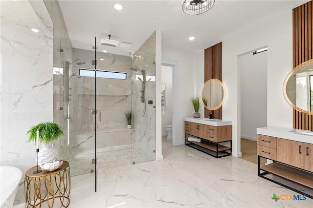 2637 Campestres, Spring Branch, TX 78070 - full bath featuring a marble finish shower, toilet, vanity, marble tiled floors, and recessed lighting