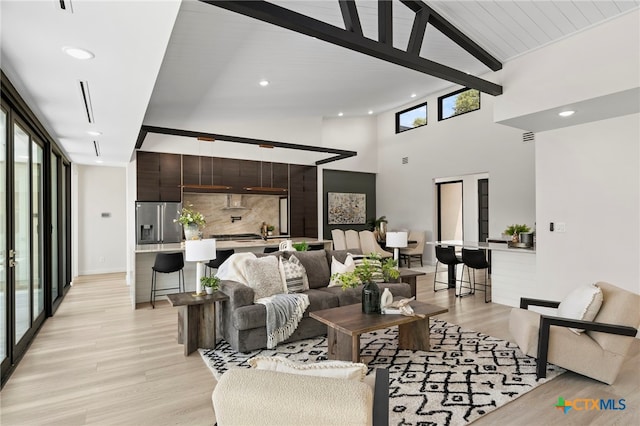 2637 Campestres, Spring Branch, TX 78070 - living room featuring light wood-style floors, beamed ceiling, high vaulted ceiling, and recessed lighting