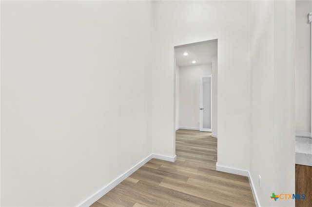 2637 Campestres, Spring Branch, TX 78070 - corridor with light wood-style floors, baseboards, and recessed lighting