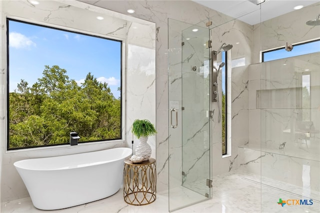 2637 Campestres, Spring Branch, TX 78070 - full bathroom featuring marble tiled floors, a marble finish shower, a freestanding tub, and recessed lighting