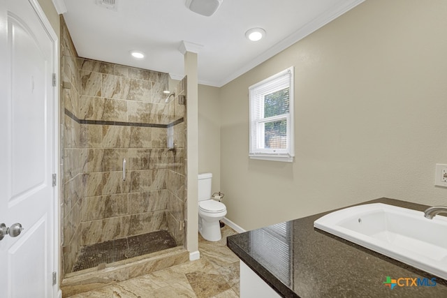 bathroom with walk in shower, ornamental molding, toilet, and sink