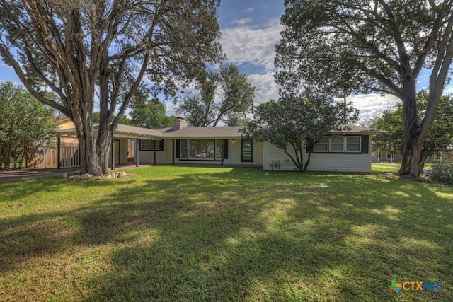 view of front of house with a front lawn