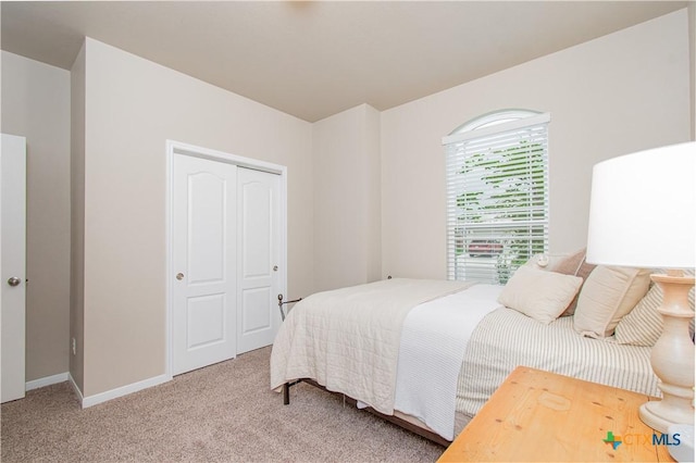 10207 Six Shooter Ln, Temple, TX 76502 - carpeted bedroom featuring a closet and baseboards