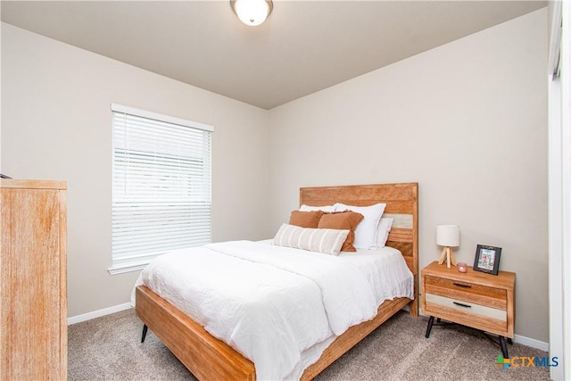 10207 Six Shooter Ln, Temple, TX 76502 - bedroom featuring carpet floors and baseboards