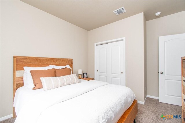 10207 Six Shooter Ln, Temple, TX 76502 - carpeted bedroom featuring baseboards and a closet