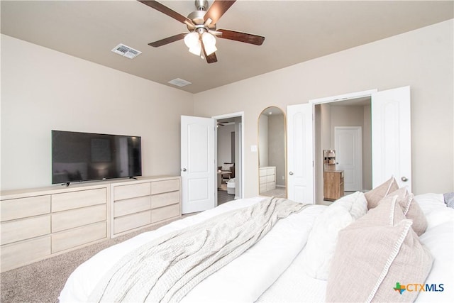 10207 Six Shooter Ln, Temple, TX 76502 - bedroom featuring carpet floors, connected bathroom, and ceiling fan