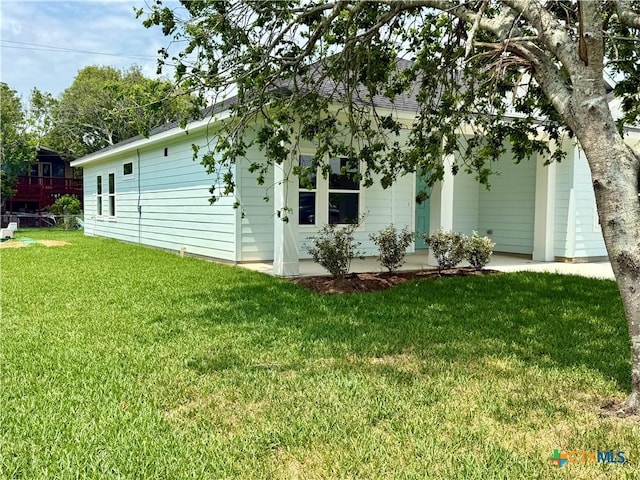 exterior space with a lawn