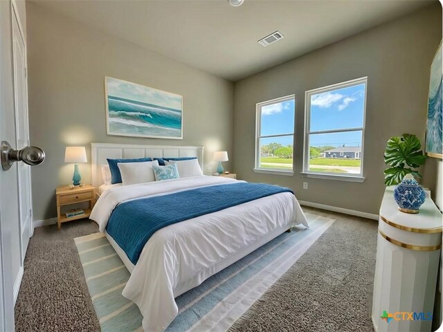 carpeted bedroom with baseboards and visible vents