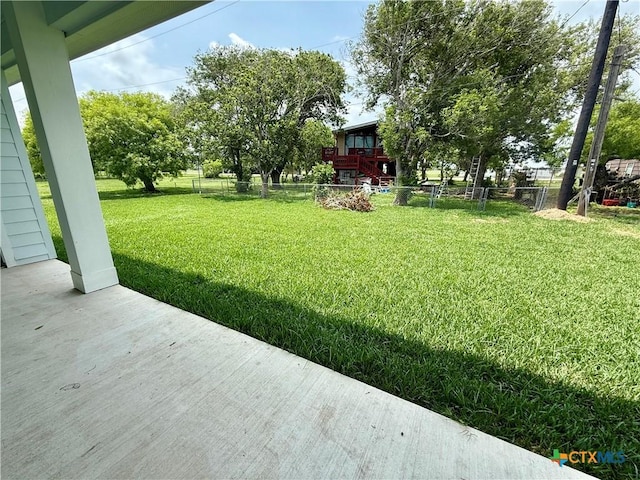 view of yard featuring fence