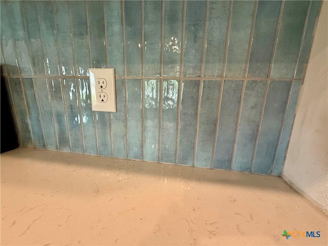 interior space featuring a gate