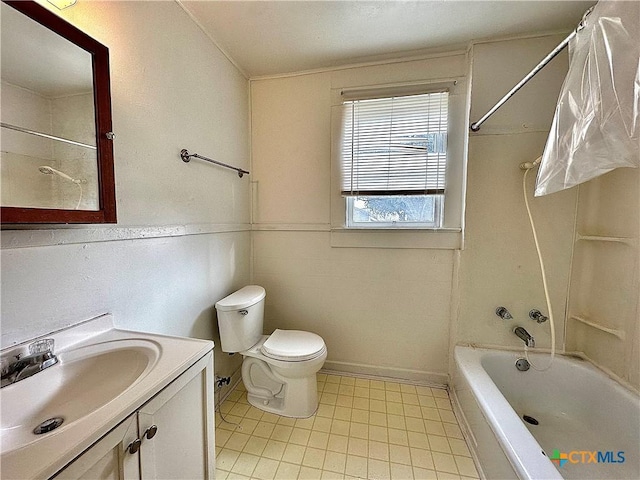 bathroom featuring  shower combination, vanity, toilet, and baseboards