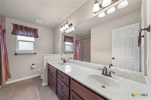 519 Gianotti Ct, Temple, TX 76502 - full bathroom with double vanity, tile patterned floors, and curtained shower