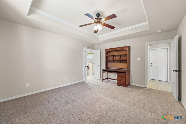 519 Gianotti Ct, Temple, TX 76502 - unfurnished bedroom with a raised ceiling, light carpet, crown molding, and a ceiling fan