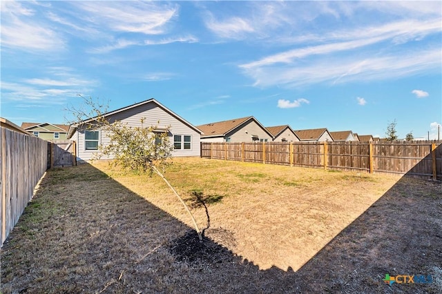 view of yard featuring a fenced backyard