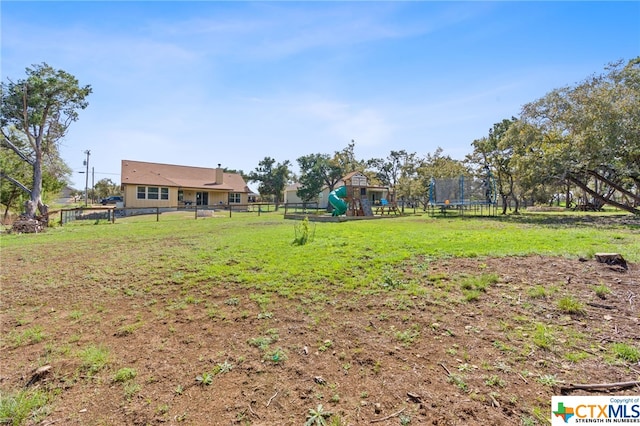 view of yard featuring a playground