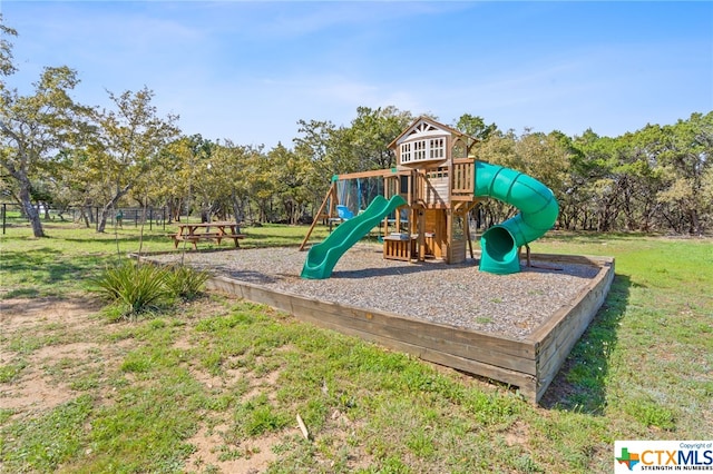 view of playground featuring a yard