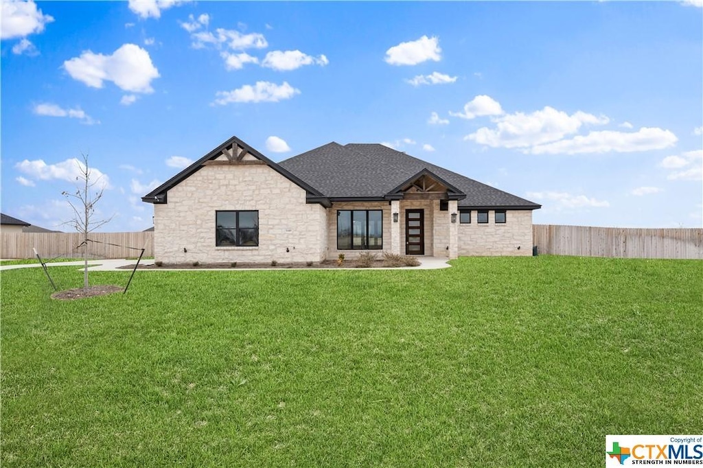 1448 King Ranch Rd, Salado, TX 76571 - view of front of house with stone siding and a shingled roof