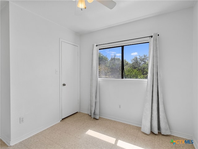 10619 Marshitahs Way, Austin, TX 78748 - unfurnished room featuring ceiling fan and tile patterned floors