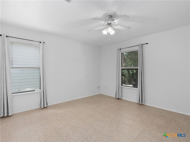 10619 Marshitahs Way, Austin, TX 78748 - empty room with ceiling fan and baseboards