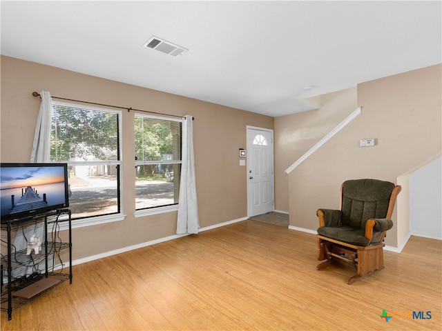 10619 Marshitahs Way, Austin, TX 78748 - foyer with light wood-type flooring and baseboards