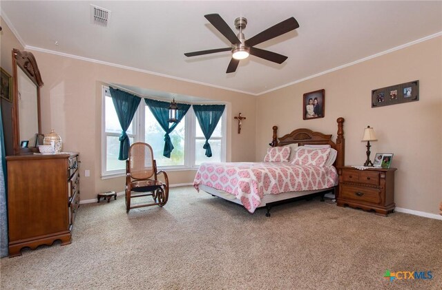 4417 S Pea Ridge Rd, Temple, TX 76502 - bedroom with ornamental molding, carpet floors, baseboards, and a ceiling fan