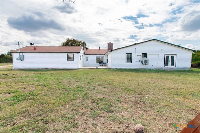4417 S Pea Ridge Rd, Temple, TX 76502 - rear view of property featuring a cooling unit, french doors, a chimney, a lawn, and a patio area