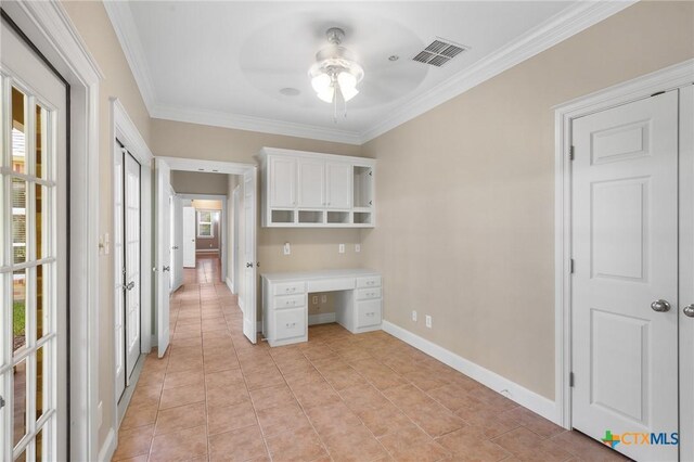 407 E Santa Rosa St, Victoria, TX 77901 - unfurnished office with ceiling fan, ornamental molding, light tile patterned flooring, baseboards, and built in study area