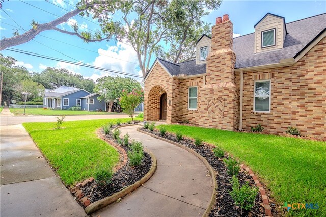 exterior space featuring a lawn