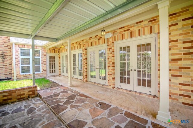 407 E Santa Rosa St, Victoria, TX 77901 - view of patio / terrace featuring french doors
