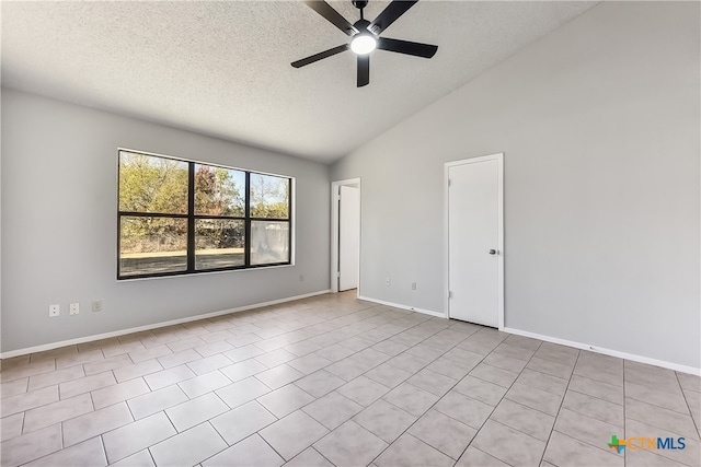 tiled empty room featuring ceiling fan, a textured ceiling, and high vaulted ceiling