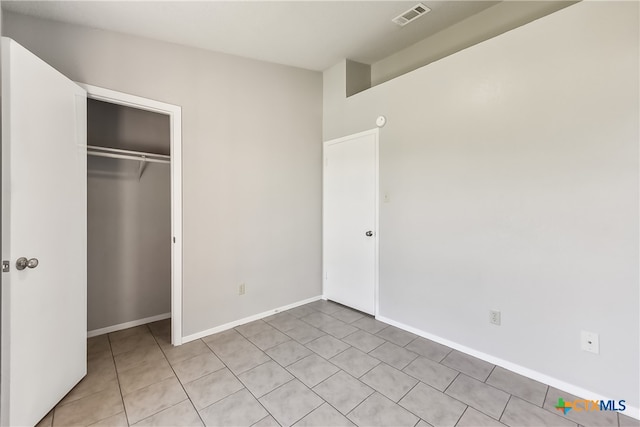 unfurnished bedroom featuring a closet