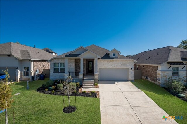 584 Tobacco Pass, New Braunfels, TX 78132 - view of front facade with an attached garage, driveway, a front lawn, and stone siding