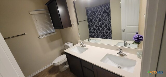 1910 Deerfield Way, Harker Heights, TX 76548 - bathroom with toilet, double vanity, a shower with shower curtain, and baseboards