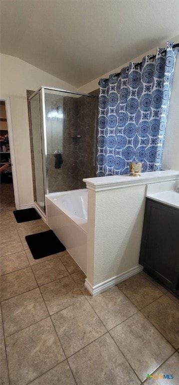 1910 Deerfield Way, Harker Heights, TX 76548 - full bath featuring a shower, vaulted ceiling, a tub to relax in, tile patterned floors, and vanity