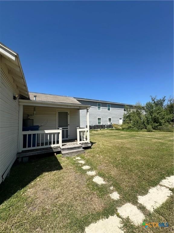 view of yard with a deck