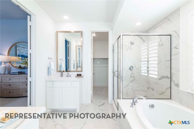 full bathroom featuring a shower stall, a bath, vanity, recessed lighting, and marble finish floors