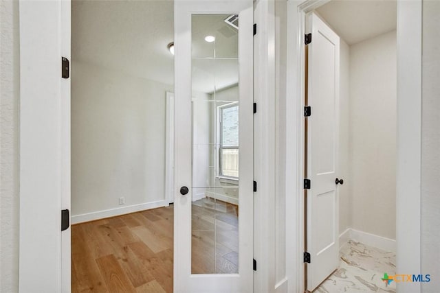 1826 Nettletree Rd, New Braunfels, TX 78132 - hallway with baseboards and light wood-type flooring