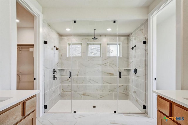 1826 Nettletree Rd, New Braunfels, TX 78132 - bathroom featuring vanity, a shower stall, a spacious closet, and recessed lighting