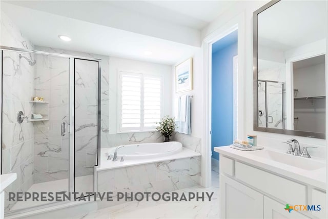 bathroom featuring a marble finish shower, marble look tiles, a garden tub, vanity, and recessed lighting