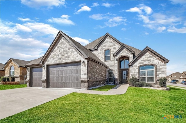 french country inspired facade with a front yard and a garage