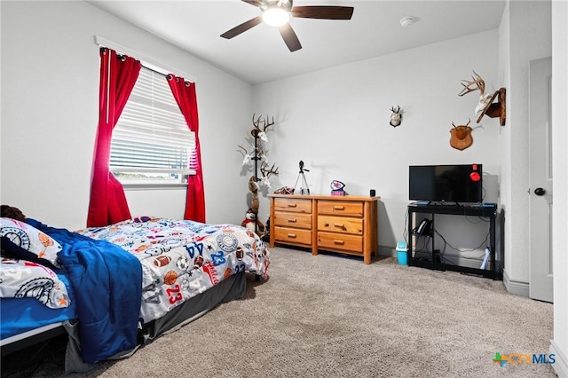 bedroom featuring carpet flooring and ceiling fan