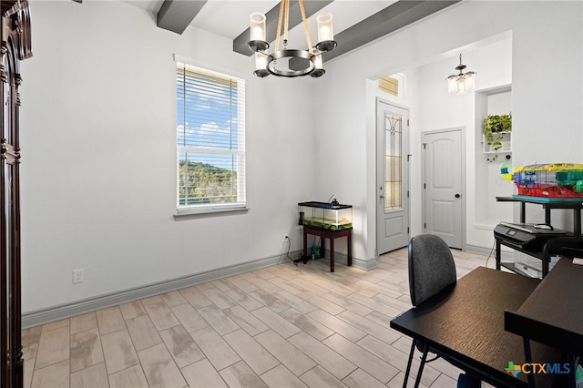 office with beamed ceiling and a notable chandelier