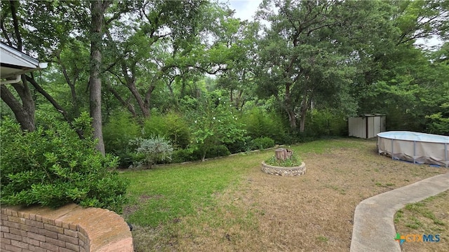 4002 El Capitan Dr, Temple, TX 76502 - view of grassy yard featuring an outdoor pool