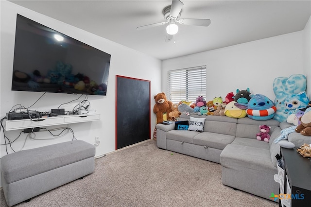 living room with light carpet and ceiling fan